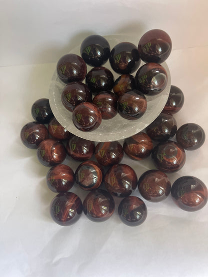 Red tigers eyes spheres